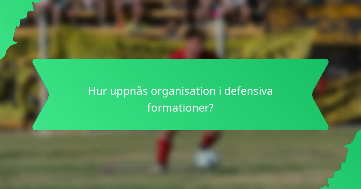 Hur uppnås organisation i defensiva formationer?